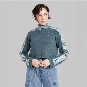 Blue target sweater